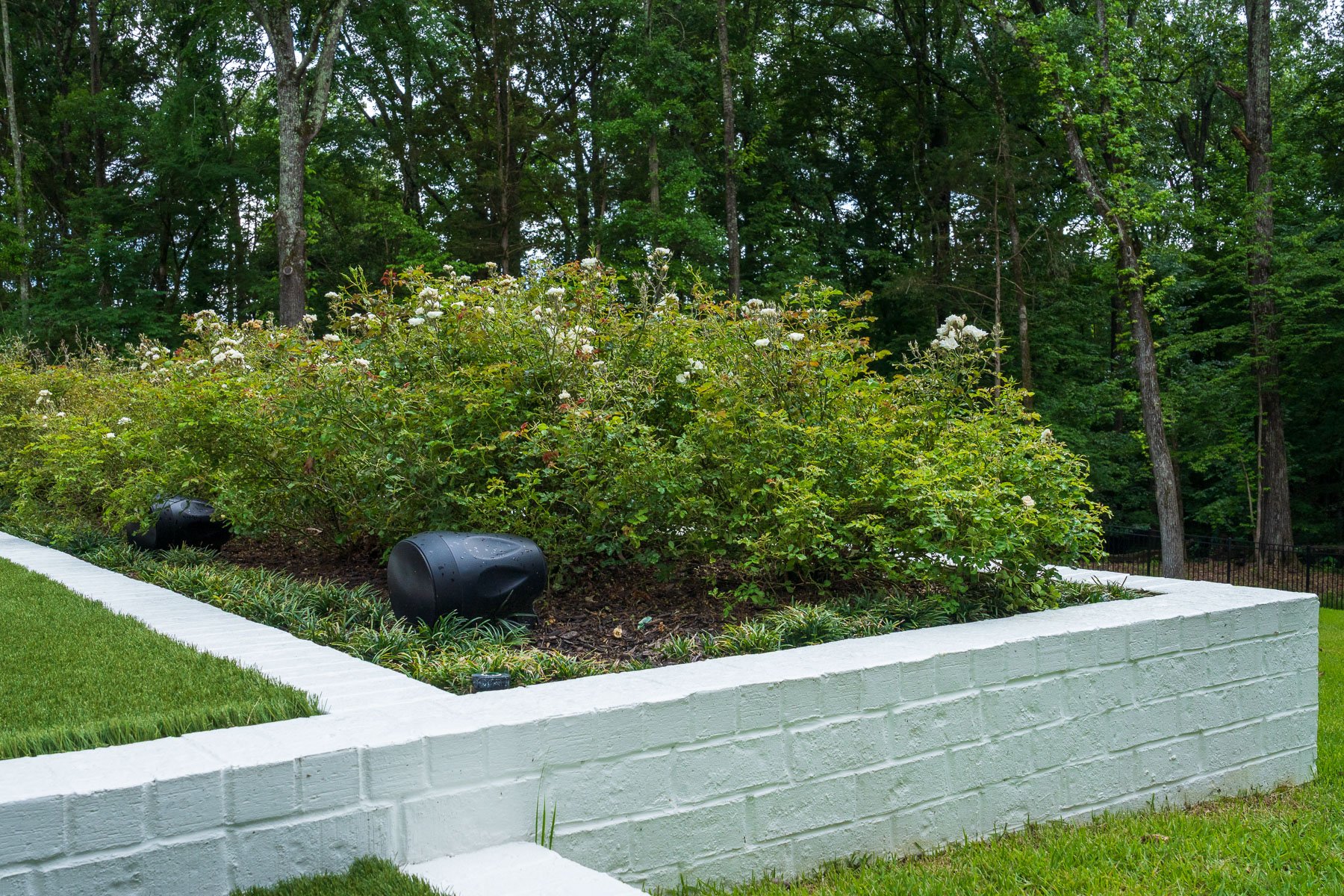brick planting bed audio speaker