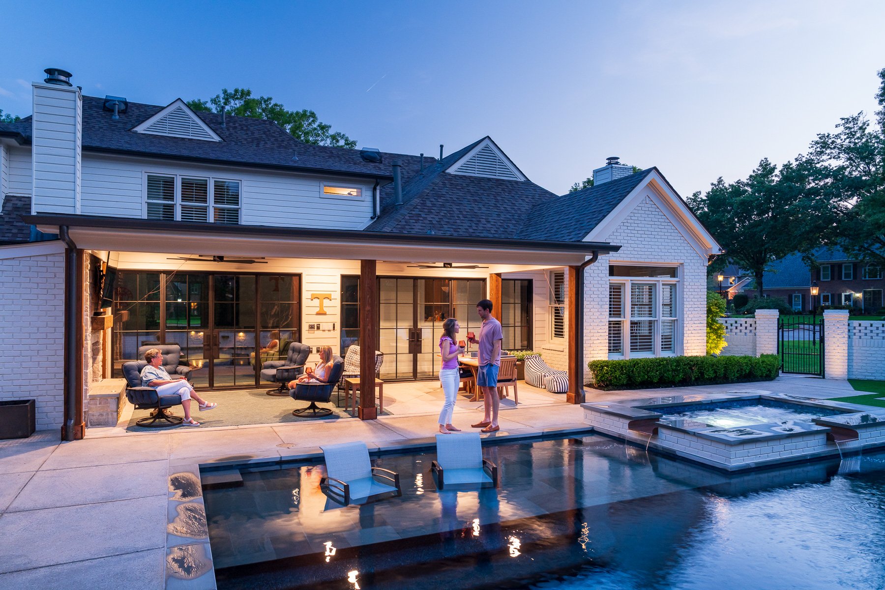 customers happy lighting covered patio seating pool spa