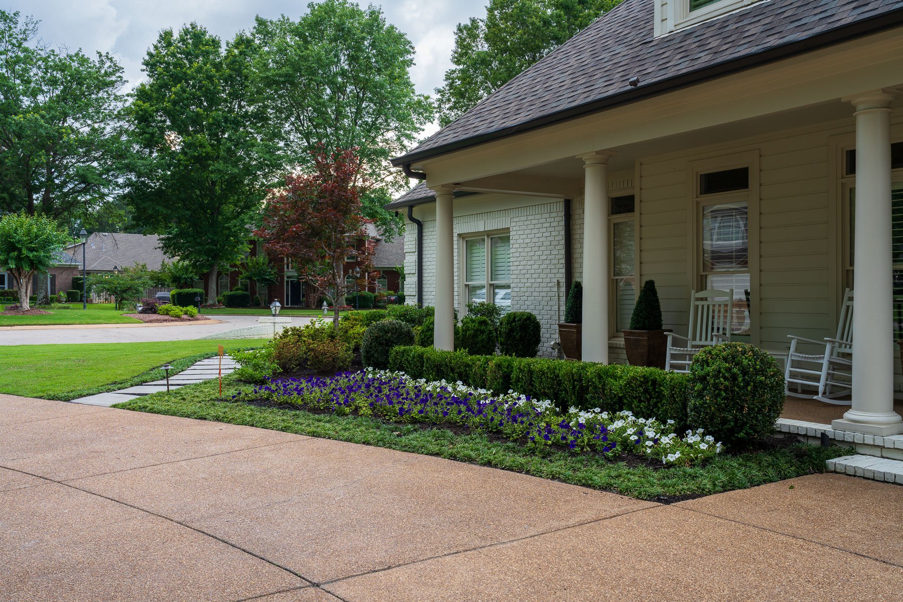 planting bed flowers porch driveway stepper path