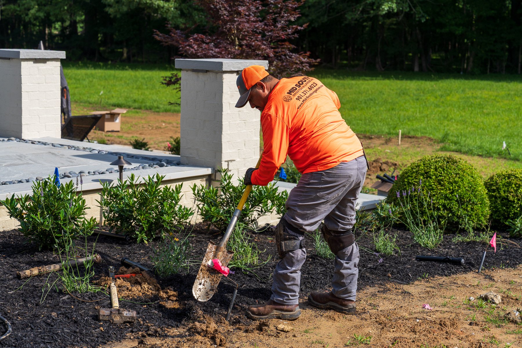 irrigation tech repair digging sharpshooter shovel sprinkler pipe planting bed