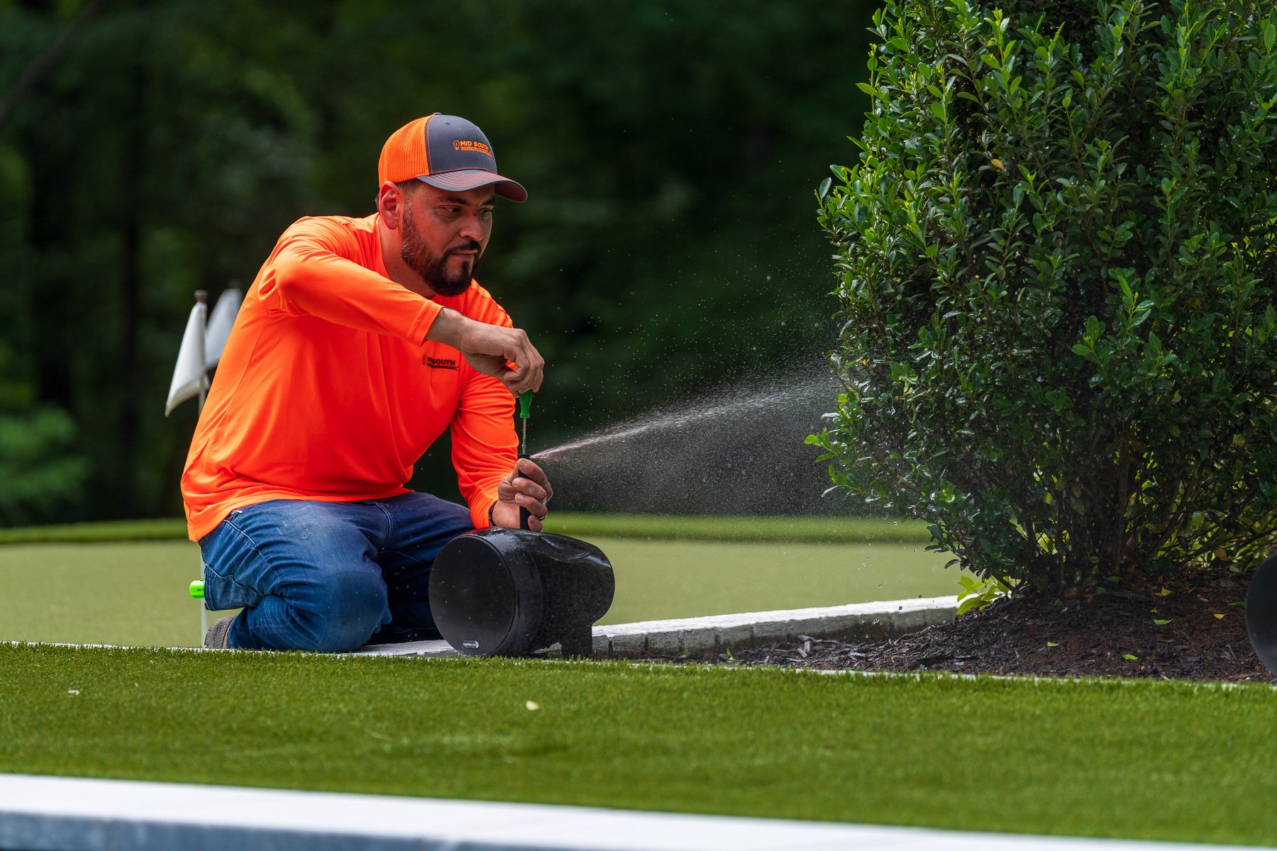 irrigation tech service adjusting sprinkler head audio speakers 3